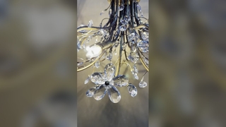 Lustre à branches dorées pour escalier et hall d'entrée