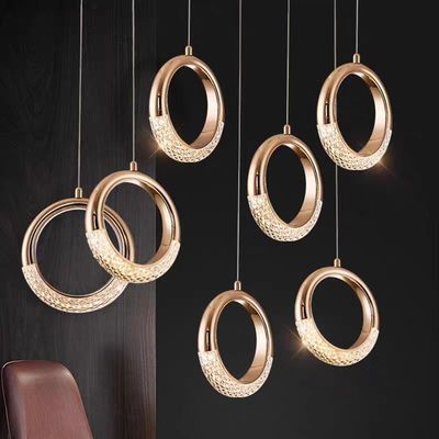 Lumière postmoderne luxe pendentif Lumière pour l'escalier de chambre et la table à manger 50000 heures Durée de vie Matériau acrylique en aluminium