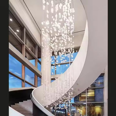 Grands chandeliers en verre de pierre lumineux de luxe art personnalisé pour l'hôtel Escalier lampe suspendue